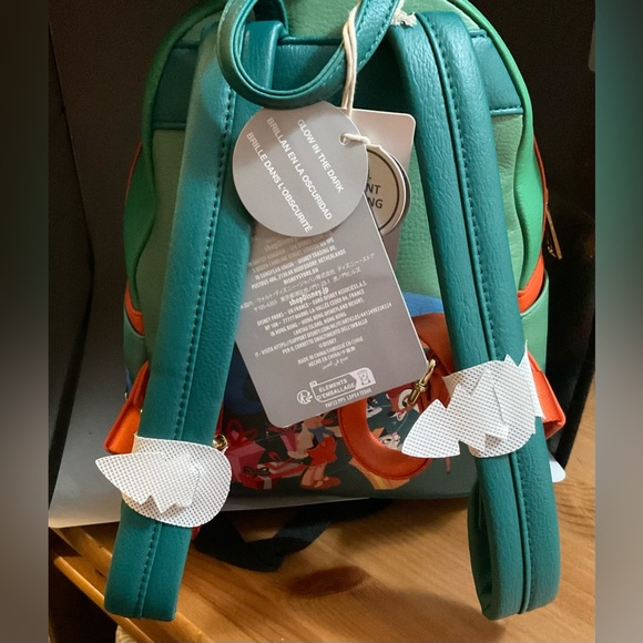 Disney: Loungefly Classic Christmas glow in the dark mini backpack green &orange - Picture 8 of 9